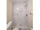 Modern bathroom with a luxurious tiled shower and built-in niche at 12 Woodland St, Dallas, GA 30157