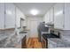 A kitchen featuring white cabinets and stainless steel appliances at 12 Woodland St, Dallas, GA 30157