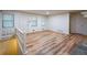 Inviting living room with hardwood floors, natural light, and access to the front entry at 12 Woodland St, Dallas, GA 30157