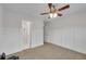Bright bedroom with trim featuring an ensuite bathroom and a ceiling fan at 2500 Madison Commons, Atlanta, GA 30360