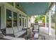 Outdoor patio with comfortable seating, a grill, and a view of the yard at 2500 Madison Commons, Atlanta, GA 30360