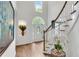 Bright foyer showcasing high ceilings, arched window, and hardwood floors at 2500 Madison Commons, Atlanta, GA 30360