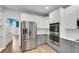 Bright kitchen featuring stainless steel appliances, custom cabinetry, and modern design at 2500 Madison Commons, Atlanta, GA 30360