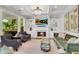Inviting living room with fireplace, built-in shelves, and sophisticated decor at 2500 Madison Commons, Atlanta, GA 30360