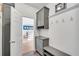 Mud room entrance featuring storage cabinets and a coat rack at 2500 Madison Commons, Atlanta, GA 30360