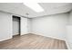 Finished basement features vinyl flooring, closet, and abundant space for storage and entertainment at 5141 Rocky Run, Stone Mountain, GA 30088