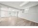 Clean basement with vinyl floors and ample light, offering versatile space for various needs at 5141 Rocky Run, Stone Mountain, GA 30088
