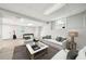 Stylishly furnished basement with neutral tones, offering a welcoming space for relaxation and entertainment at 5141 Rocky Run, Stone Mountain, GA 30088