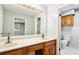 Bathroom features a double vanity, updated fixtures, and a separate toilet area at 5141 Rocky Run, Stone Mountain, GA 30088