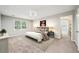 Serene bedroom with neutral colors, soft carpet, and ample natural light at 5141 Rocky Run, Stone Mountain, GA 30088