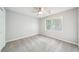 Bedroom with carpet flooring and natural light from window at 5141 Rocky Run, Stone Mountain, GA 30088