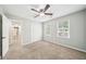 Bedroom with carpeting and two windows at 5141 Rocky Run, Stone Mountain, GA 30088