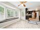 Bright breakfast nook with a bay window and wood-look flooring, next to the kitchen at 5141 Rocky Run, Stone Mountain, GA 30088