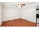 Bright dining room with hardwood floors and crown molding at 5141 Rocky Run, Stone Mountain, GA 30088