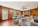 Inviting living room featuring a fireplace, built-in shelving, and hardwood floors at 5141 Rocky Run, Stone Mountain, GA 30088
