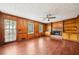Bright living room with hardwood floors, fireplace and built-in shelving at 5141 Rocky Run, Stone Mountain, GA 30088