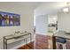 Bright dining area with hardwood floors, modern lighting, and artwork enhancing the ambiance at 195 14Th Ne St # 1706, Atlanta, GA 30309