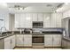 Well-equipped kitchen with stainless steel appliances, ample cabinet space, and modern fixtures at 195 14Th Ne St # 1706, Atlanta, GA 30309