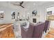 Bright living room featuring hardwood floors, a fireplace, white walls, and coffered ceilings at 2018 Presley Ne Way, Atlanta, GA 30317
