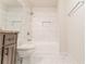 Bright bathroom showcasing white marble tile, and modern fixtures at 3474 Washington Way, Atlanta, GA 30340