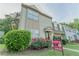 Charming townhome featuring well-maintained landscaping and neutral siding for a welcoming curb appeal at 3474 Washington Way, Atlanta, GA 30340