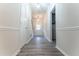 Inviting hallway featuring new flooring, modern lighting, and neutral paint, creating a bright atmosphere at 3474 Washington Way, Atlanta, GA 30340