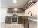 Updated kitchen featuring granite countertops, stainless steel appliances, and ample cabinet space at 3474 Washington Way, Atlanta, GA 30340
