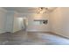 Bright living room with modern flooring and an open layout creating a warm and inviting space at 3474 Washington Way, Atlanta, GA 30340