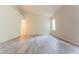 Spacious living room featuring vaulted ceiling and abundant natural light at 3474 Washington Way, Atlanta, GA 30340