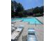 Inviting community pool featuring ample lounge seating and well-maintained surrounding area, perfect for summer enjoyment at 3474 Washington Way, Atlanta, GA 30340