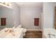 Bright bathroom includes a walk-in shower, jetted tub, and modern fixtures at 3594 Saddlebrook Dr, Loganville, GA 30052