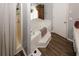 Relaxing bathroom with a large jetted tub, a shower and a white door at 3594 Saddlebrook Dr, Loganville, GA 30052