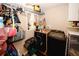 Functional laundry area with modern washer and dryer, storage shelves, and natural light at 3594 Saddlebrook Dr, Loganville, GA 30052