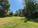 Image of a durable and spacious outbuilding with ample yard space and easy access, ideal for storage at 3594 Saddlebrook Dr, Loganville, GA 30052