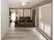 Sunroom with tile floors, recessed lighting, and modern privacy shutters at 3594 Saddlebrook Dr, Loganville, GA 30052
