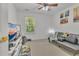 Spacious bedroom with modern decor, ceiling fan, and window for natural light at 3610 Darcy Nw Ct, Kennesaw, GA 30144