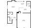 Layout of the first floor showing the living room, kitchen, dining area, and garage at 3610 Darcy Nw Ct, Kennesaw, GA 30144