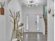 Foyer with grey wood-style floors, pendant lighting, decor, and a staircase at 3610 Darcy Nw Ct, Kennesaw, GA 30144