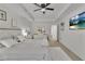 Inviting main bedroom with tray ceiling, modern fan, and contemporary decor at 3610 Darcy Nw Ct, Kennesaw, GA 30144