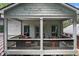 Comfortable outdoor seating on the balcony, providing a cozy space to relax and enjoy the view at 805 Ponce De Leon Ne Ter, Atlanta, GA 30306