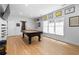 Spacious basement featuring a pool table, decor, and ample natural light from the large windows at 805 Ponce De Leon Ne Ter, Atlanta, GA 30306