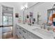 Bright, modern bathroom with double vanity, quartz countertops, and stylish decor with plenty of natural light at 805 Ponce De Leon Ne Ter, Atlanta, GA 30306