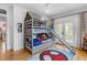 Stylish ' bedroom featuring bunk beds with slide and a cool Spider-Personal rug at 805 Ponce De Leon Ne Ter, Atlanta, GA 30306