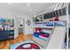 Spacious ' bedroom with bunk beds, a slide, and access to bathroom at 805 Ponce De Leon Ne Ter, Atlanta, GA 30306