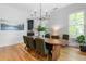 Inviting dining room with a large wooden table, comfortable chairs, and plenty of natural light at 805 Ponce De Leon Ne Ter, Atlanta, GA 30306
