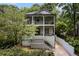 Charming two-story home with double balconies, inviting front porch, and beautifully maintained landscaping at 805 Ponce De Leon Ne Ter, Atlanta, GA 30306
