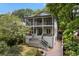 Stunning two-story home featuring double balconies, lush landscaping, and a welcoming front entrance at 805 Ponce De Leon Ne Ter, Atlanta, GA 30306