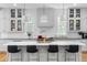 Modern kitchen with white cabinets, an island with seating, and stainless steel appliances at 805 Ponce De Leon Ne Ter, Atlanta, GA 30306