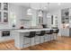 Spacious kitchen with stainless steel appliances, kitchen island and modern lighting at 805 Ponce De Leon Ne Ter, Atlanta, GA 30306