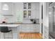 Bright kitchen featuring gray cabinets, updated appliances, and ample storage space at 805 Ponce De Leon Ne Ter, Atlanta, GA 30306